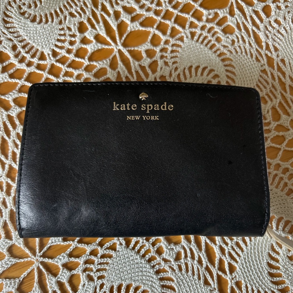 kate spade black leather zip-around wallet with gold logo